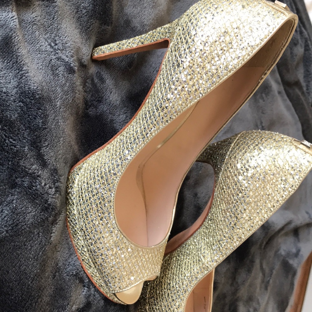 Never worn metallic peep toe heels